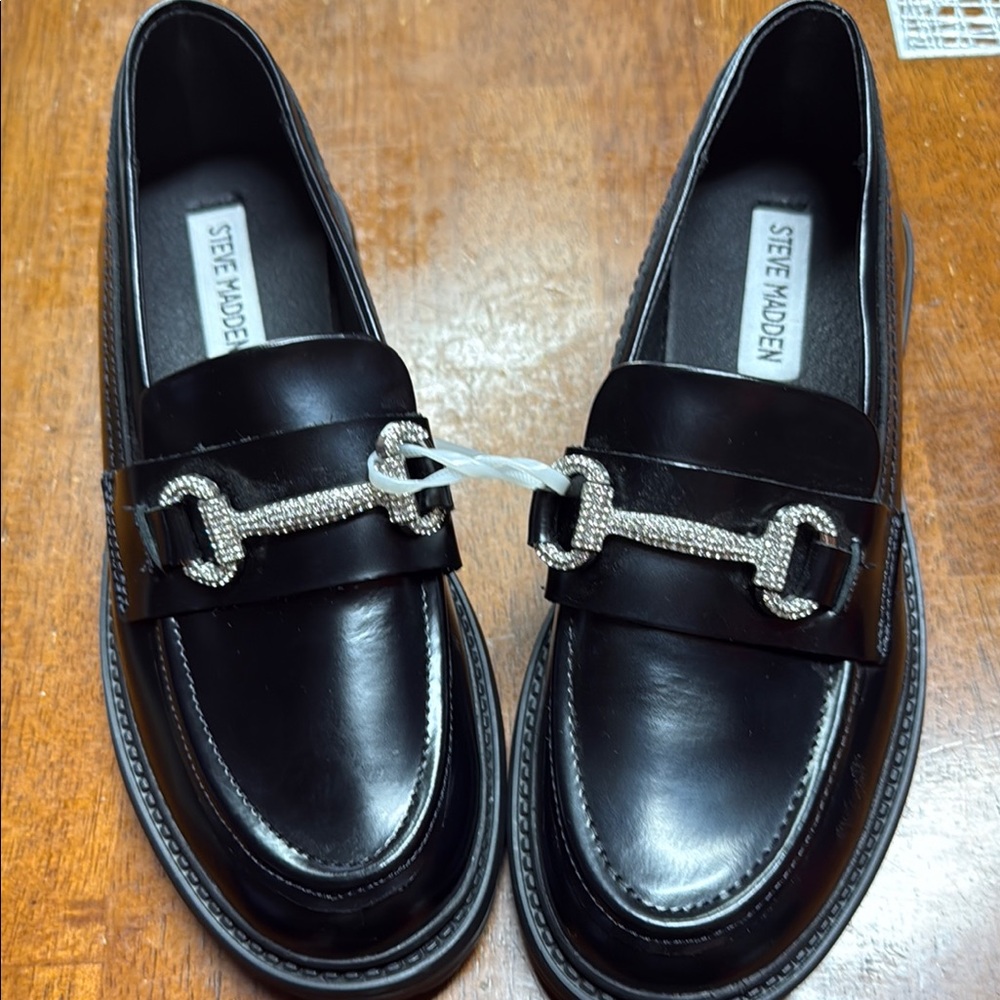Steve Madden Black Loafers with Silver Accent. New never worn.